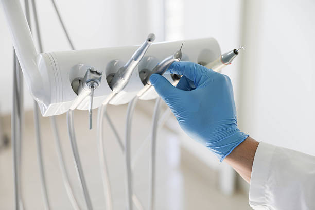Professional Tooth Extraction technician working in Traverse City, MI